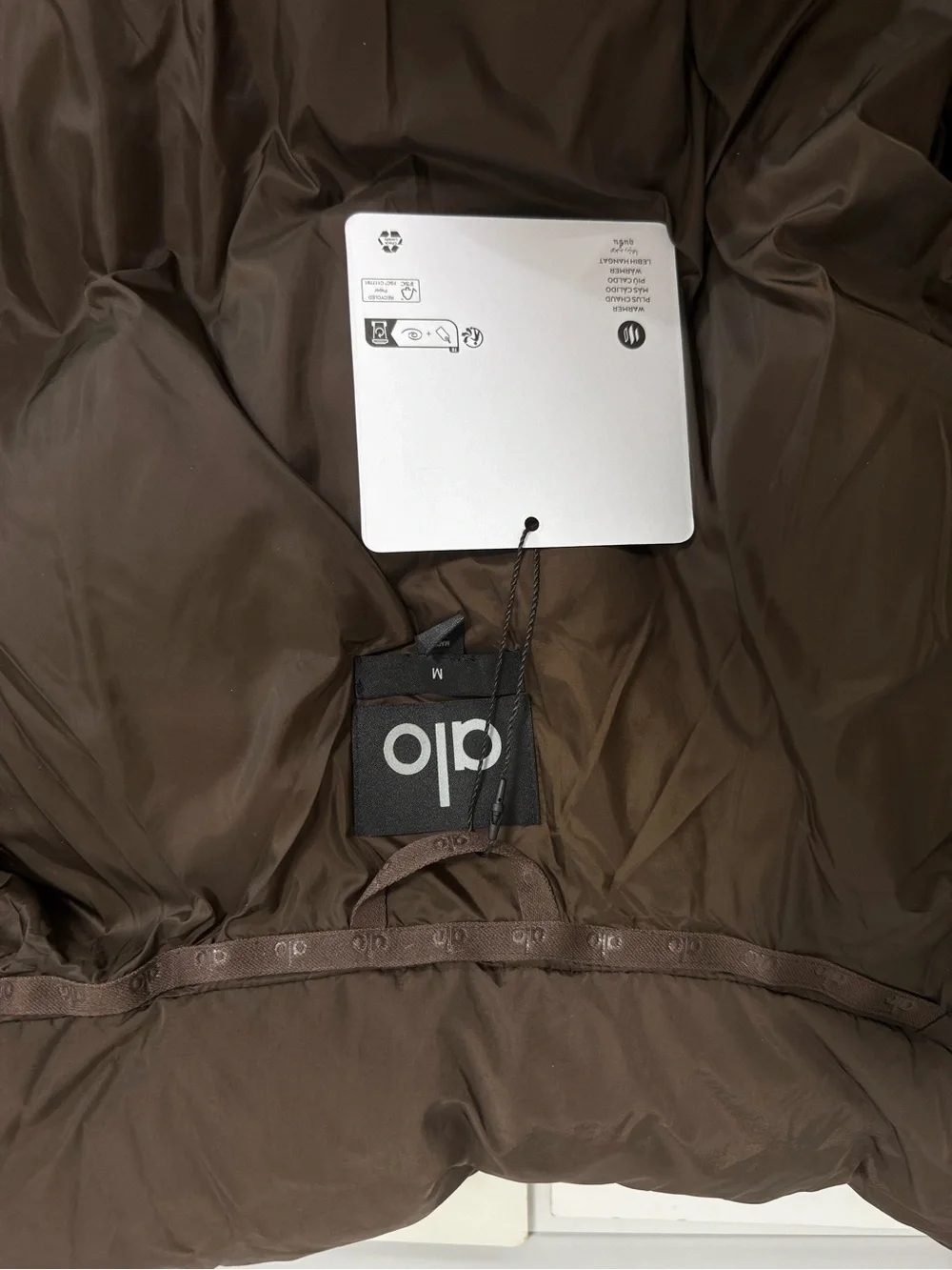 ALO Yoga Cropped Hooded Puffer Jacket in Dark Brown